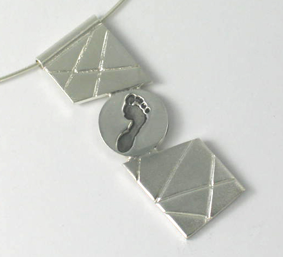 Diagonal Footprint Pendant